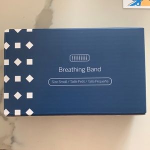 New in box, Nanit white breathing band, size small